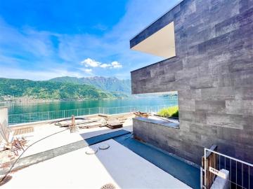 Exklusives Anwesen direkt am See, Innenlift, überdachter Liegeplatz Lugano Schweiz