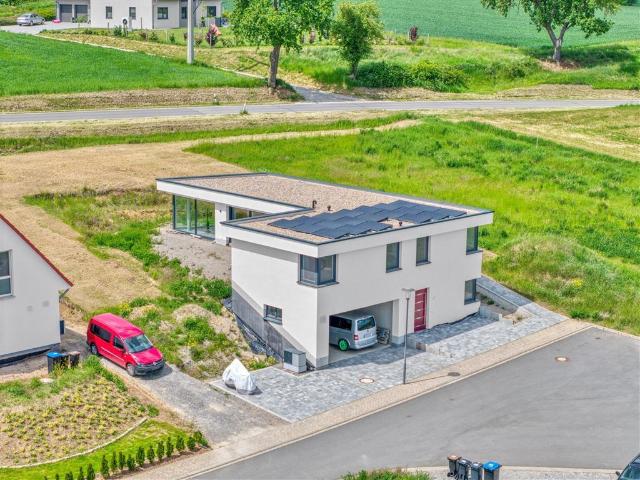 Exklusives Architektenhaus mit Einliegerwohnung – KfW 40