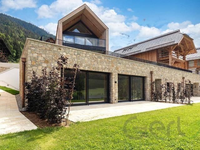 Exklusives Chalet mit Garten, Seeblick und alpinem Charme Weisse Wand Weissensee