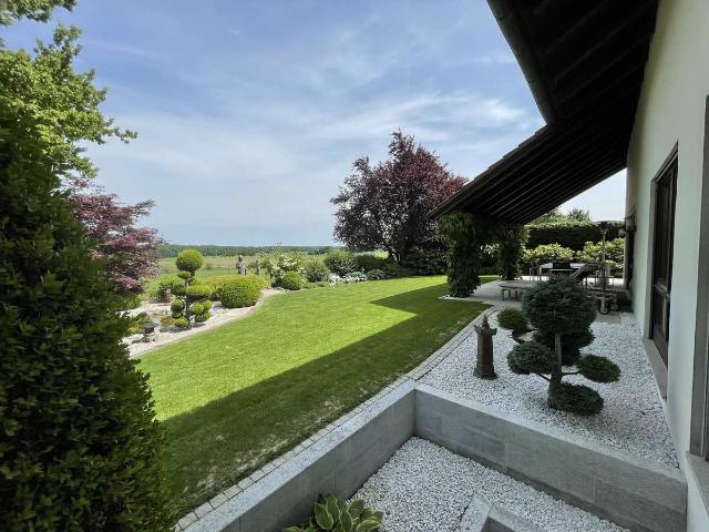Exklusives EF Haus auf 1.070 m² parkähnlichem Grund mit unverbaubarem Blick zum Ebersberger Forst