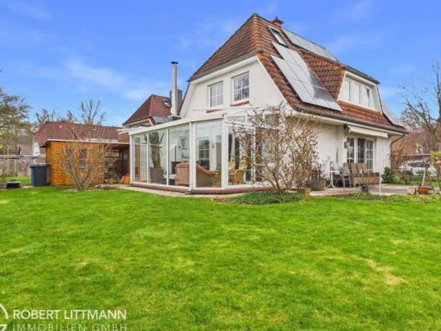 Wohnen mit besonderem Flair hochwertiges Einfamilienhaus mit Wintergarten & Design Kamin
