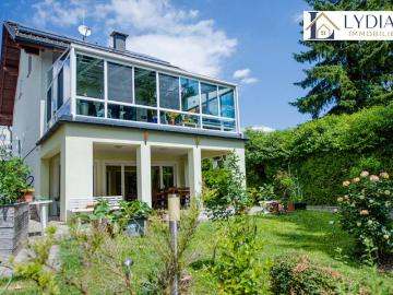 Exklusives Einfamilienhaus in ruhiger Bestlage – Wohnen mit Gartenidylle und traumhaftem Weitblick aus dem Wintergarten