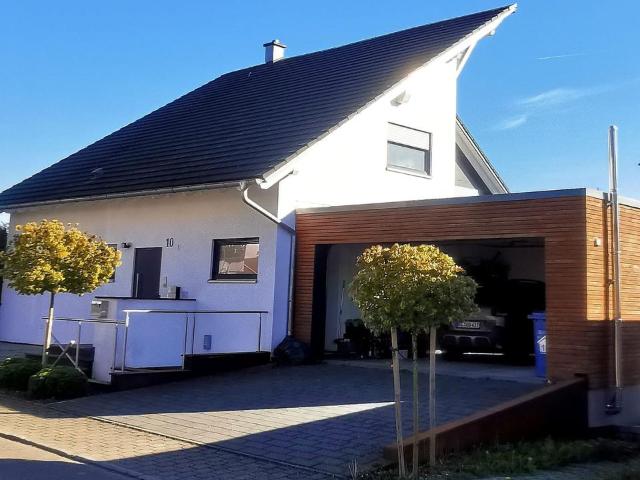 Exklusives Einfamilienhaus mit Einliegerwohnung, Wintergarten & e