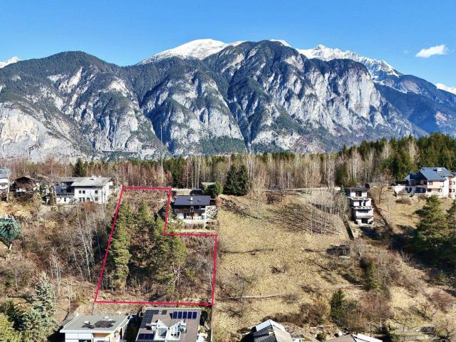 Baubescheid: Projektiertes Grundstück mit unverbaubarer Panoramaaussicht in Sonnenhanglage von Omes bei Axams
