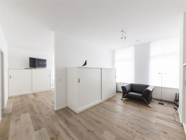 Exklusives Penthouse mit hochwertiger Einbauküche und Dachterrasse in direkter Innenstadtlage