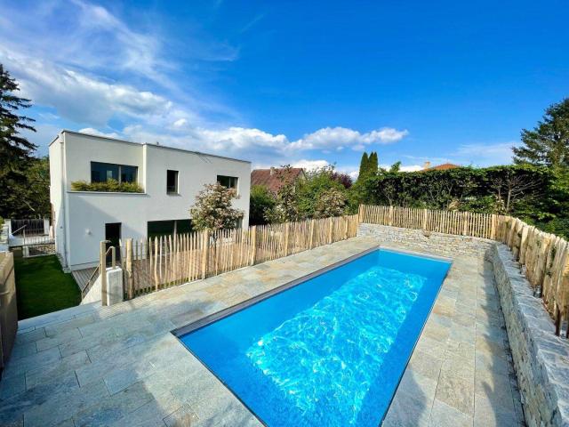 Exklusives Traumhaus im Grünen mit Fernblick & großem Pool am Kahlenberg Neubau