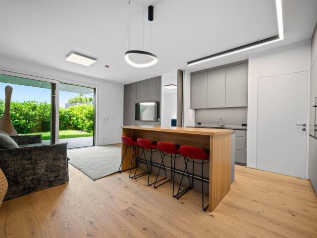 Exklusives Wohnen im Grünen – Möblierte Wohnung mit Terrasse und Garten und Gemeinschaftspool