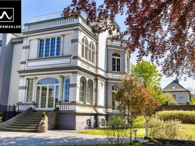 Exklusives Wohnen in historischer Fabrikantenvilla – Gartenwohnung mit besonderem Charme