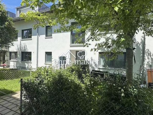 Exklusives Wohnen in Neubiberg: Moderne Eigentumswohnung mit Garten & Stellplätzen