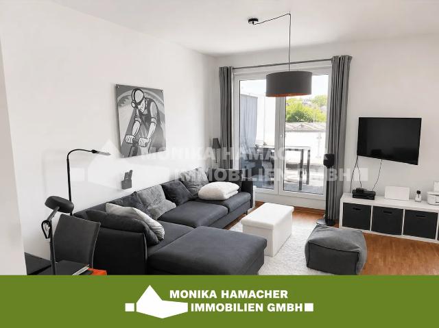 Exklusives Wohngefühl auf zwei Zimmern – Moderne Wohnung mit großem Balkon