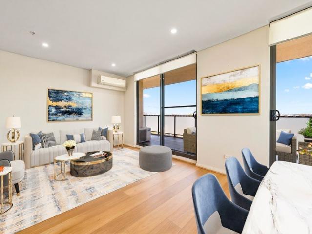 Expansive 196sqm Three Bedroom Apartment with Study, Wraparound Balcony and Urban Views
