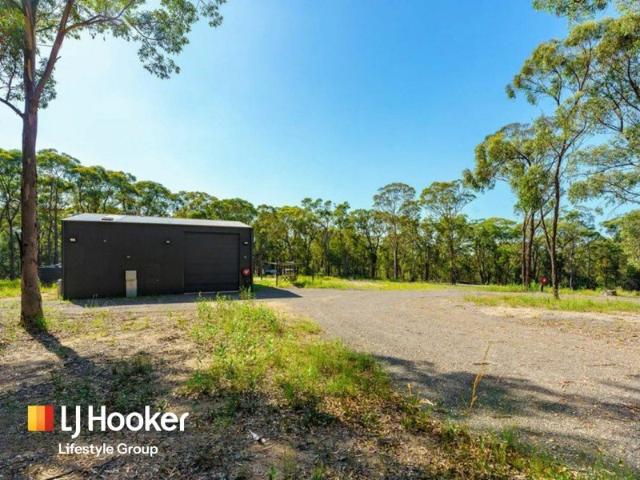 Expansive 9.6 Acre Commercial Space Shed & Land