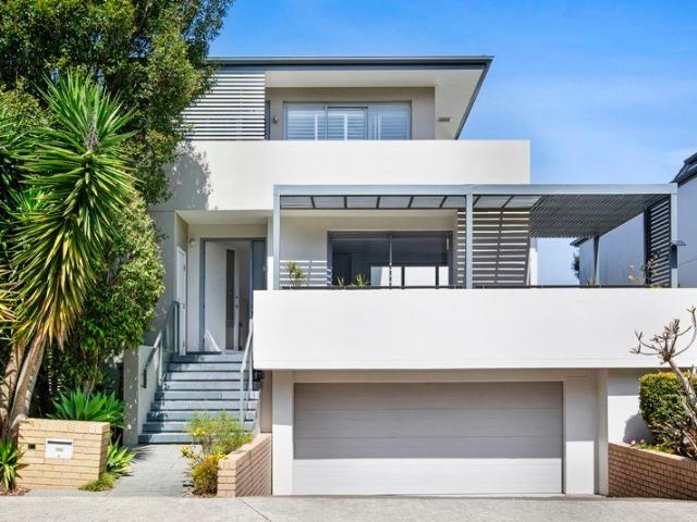Expansive Coastal Family Home In Quiet Setting
