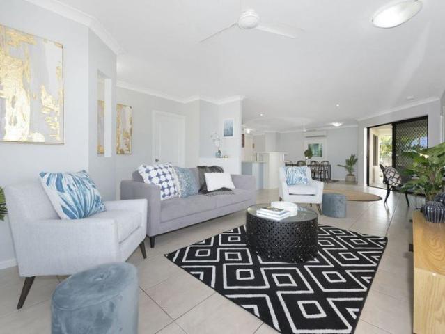 EXPANSIVE, CAREFREE, BEACHSIDE LIVING AT ITS VERY BEST