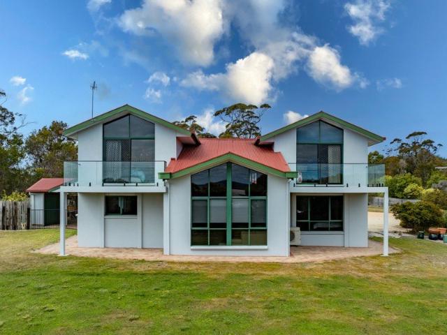 Expansive craftsman built character home with additional two bedroom accommodation