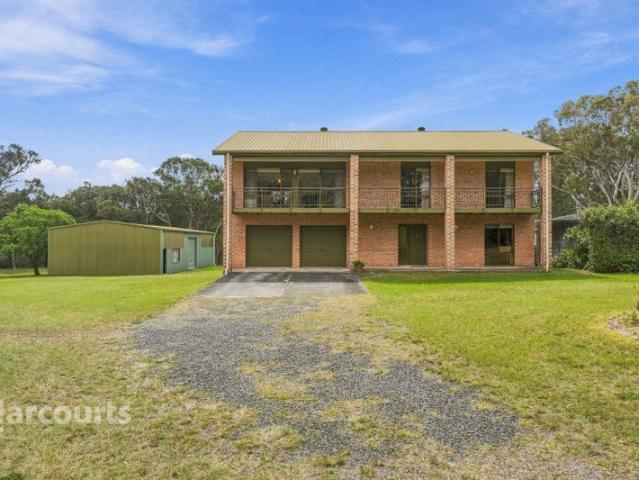 Expansive Acreage Living with Elevated Views & Exceptional Family Space