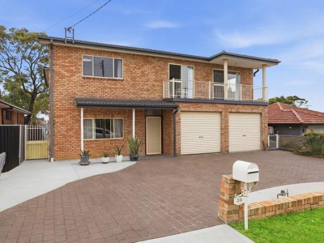 Expansive Brick Family Home with Cathedral Ceilings and Exceptional Indoor Outdoor Living