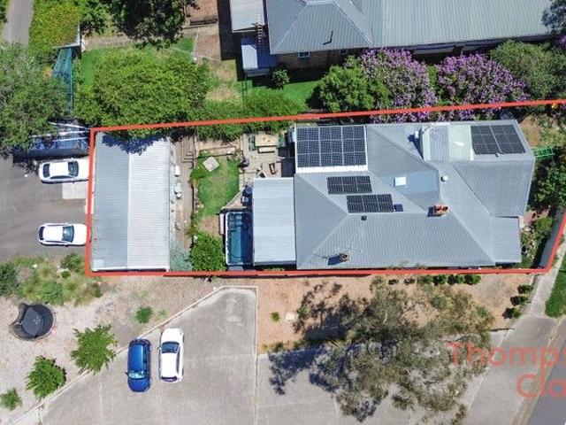 Expansive Dual Living Residence with Rear Access, 5 Car Parking & Air Conditioning Throughout