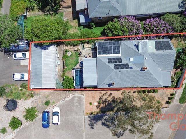 Expansive Dual Living Residence with Rear Access, 5 Car Parking & Air Conditioning Throughout