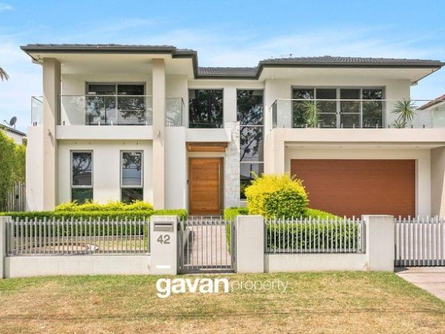 Expansive Family Haven in a Prestigious Waterside Setting