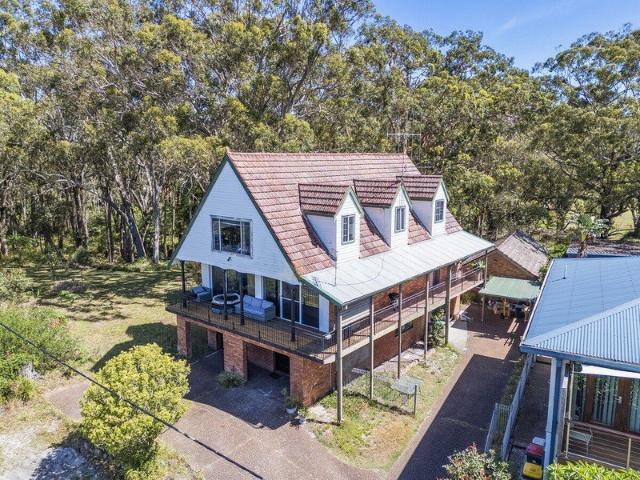 Expansive Family Home with Water Views & Potential