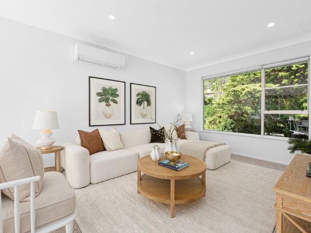 Expansive Family Home with Private Backyard in a Peaceful Middle Cove Setting