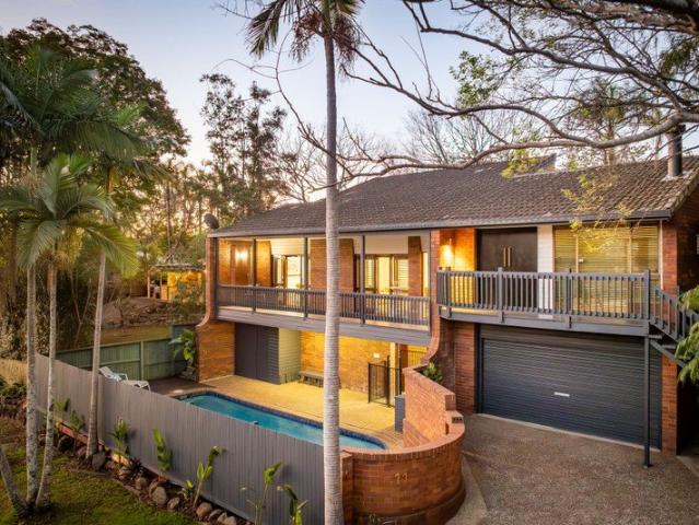 Expansive Family Living with a Poolside Setting