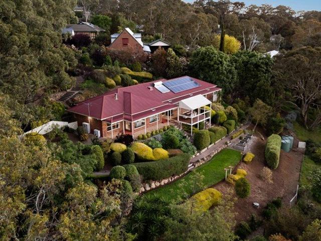 Expansive Family Living with Breathtaking Hillside Views