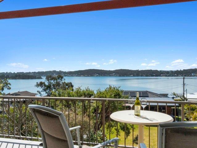 Expansive Family Living with Panoramic Lake Views