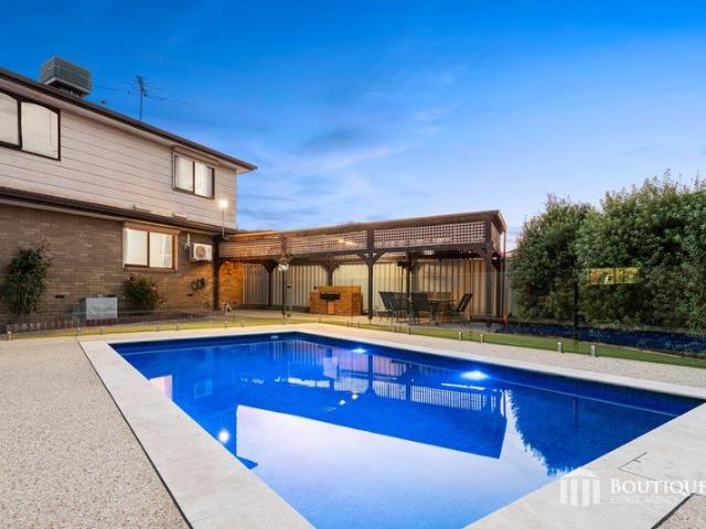 Expansive Family Living with Poolside Entertainment