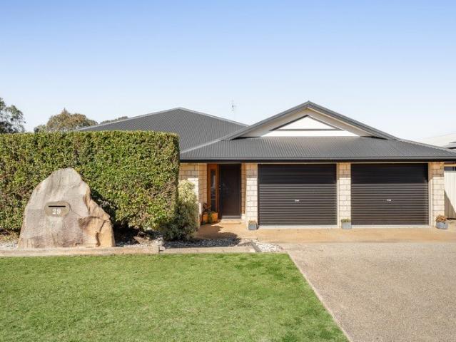 Expansive Family Living with Resort Style Pool Backing Onto Parkland