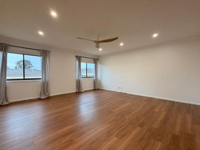 Expansive Family Living with Space, Style and Comfort