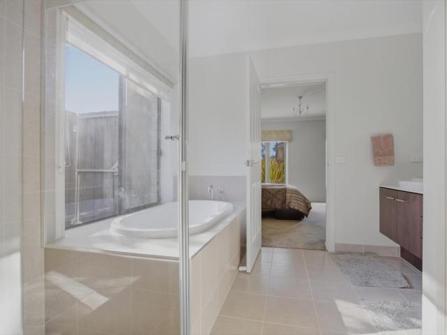 Expansive Family Living with Two Main Bedrooms