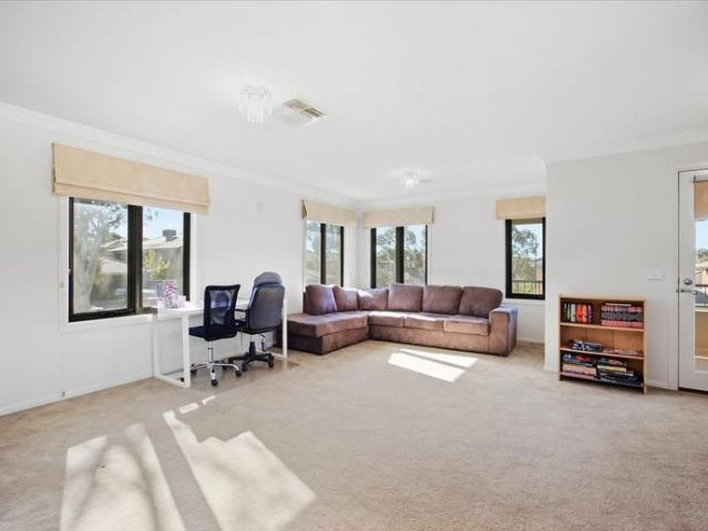 Expansive Family Living with Two Main Bedrooms