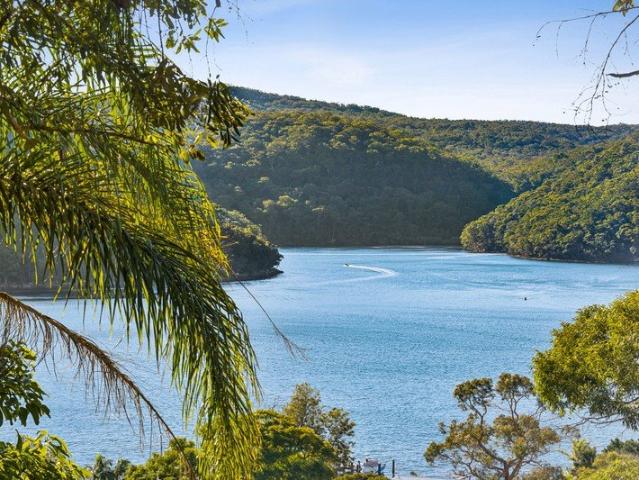 Expansive family living with water views