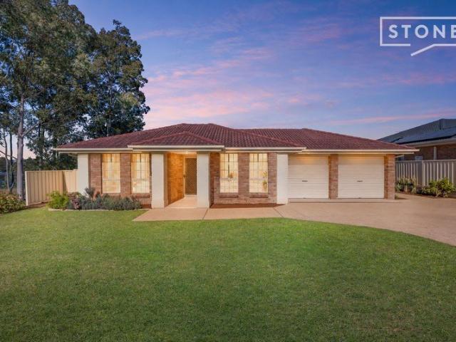 Family home with rare side access in prized Vineyard Grove