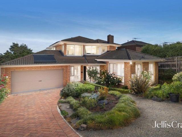 Expansive family sanctuary in an idyllic garden setting