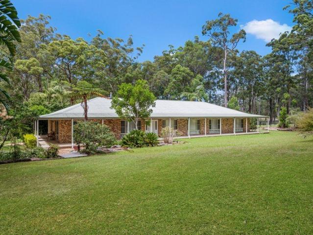 Expansive Home on Peaceful Acreage, Minutes from the Beach