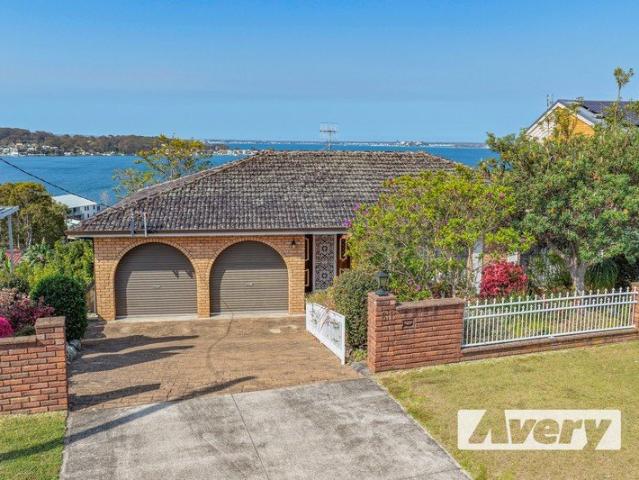 Expansive Lake Views with Plenty of Potential