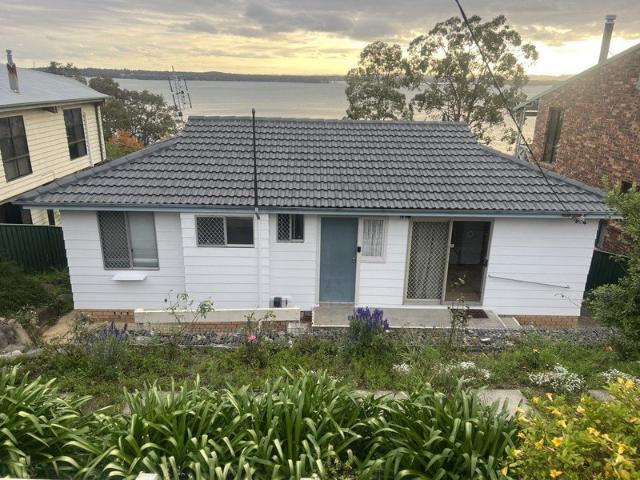Expansive Lake Views & Relaxed Living