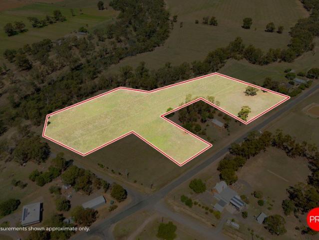 Expansive Lifestyle Acreage with River Backdrop