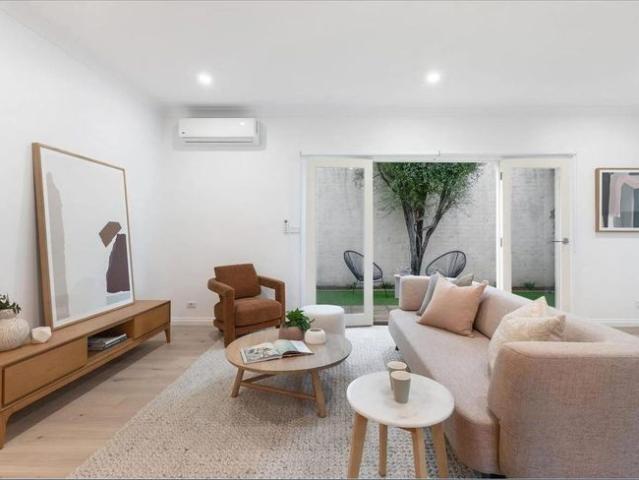 EXPANSIVE SINGLE LEVEL ON THE EDGE OF THE STRIP!