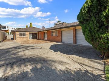 Expansive single level living in a beautiful bayside location