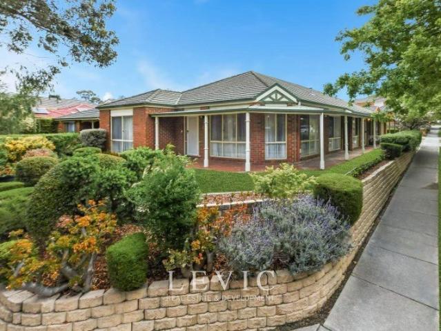 Expansive Single Level with Park Views and Triple Living Zones
