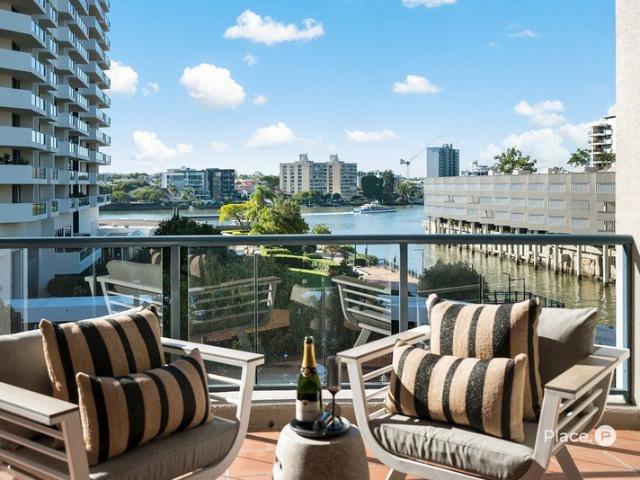 Expansive Peninsula Living with Tranquil River Outlook
