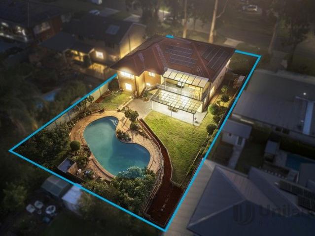 Expansive proportions offer ideal multi generational privacy, close to rail and schools!