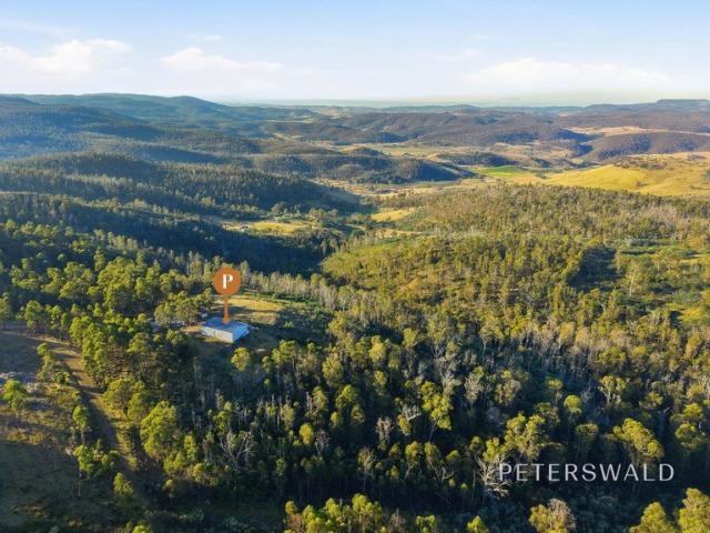 Expansive Rural Acreage with Panoramic Views