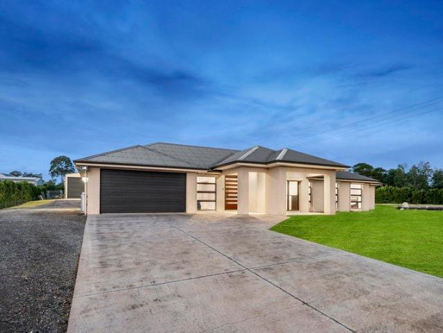 Expansive Rural Retreat with Massive Shed
