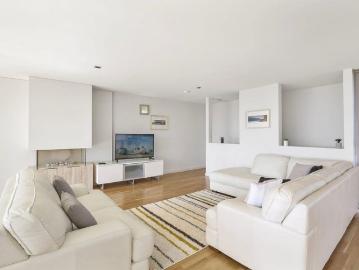 Expansive Waterfront Penthouse with Panoramic Rooftop Views