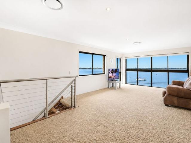 Expansive Two Level Penthouse with Uninterrupted Broadwater Views